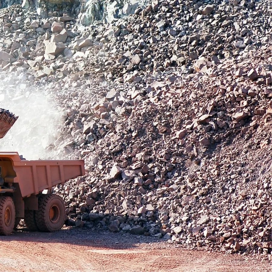 Iron ore tailings being loaded at a mine site, the safe-waste that goes into every Hybrid Sleeper